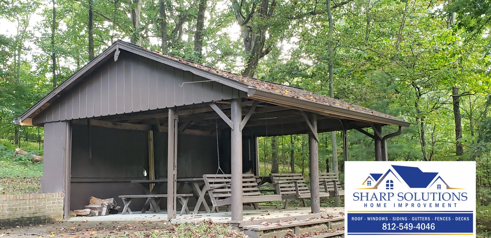 Black Roofing Tile New Roof Gutters on porch Deck overlooking the backyard Window overlooking patio