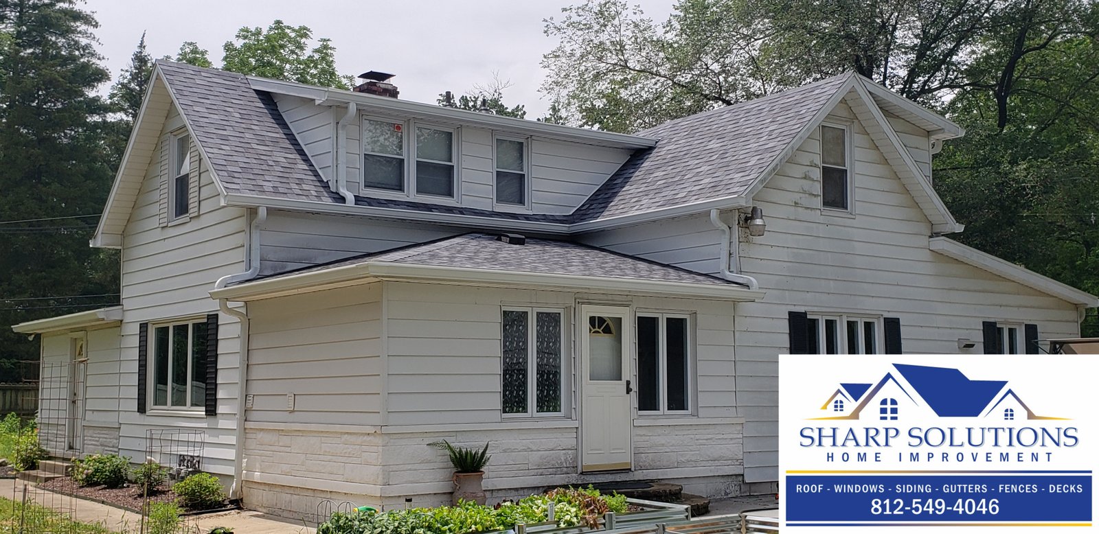 Black Roofing Tile New Roof Gutters on porch Deck overlooking the backyard Window overlooking patio