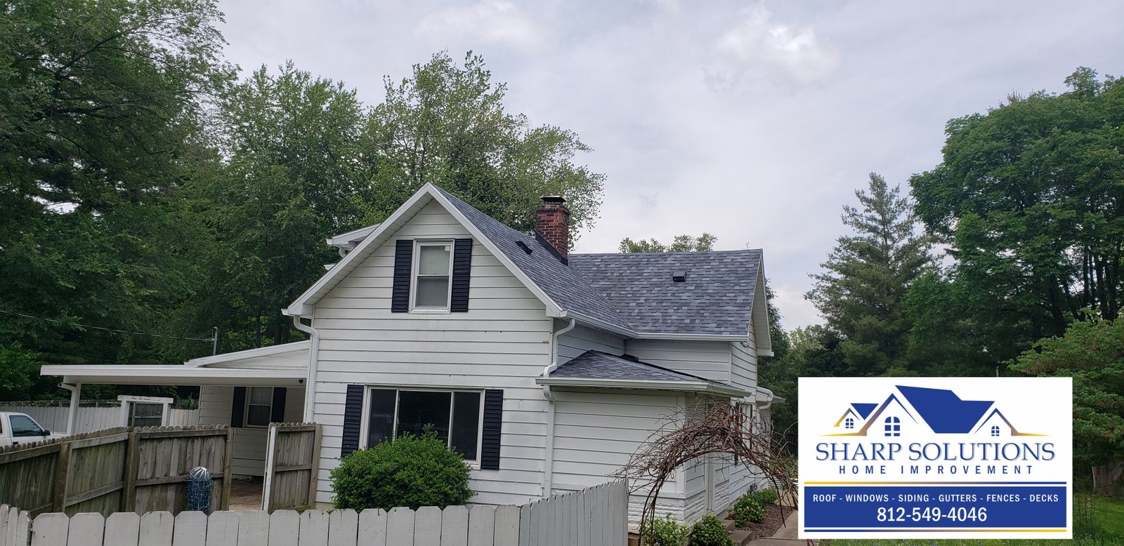 Black Roofing Tile New Roof Gutters on porch Deck overlooking the backyard Window overlooking patio