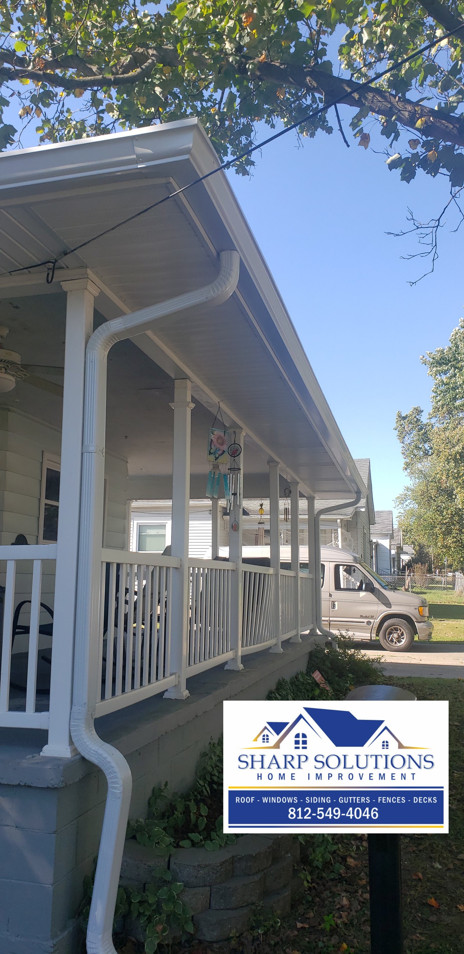 Black Roofing Tile New Roof Gutters on porch Deck overlooking the backyard Window overlooking patio