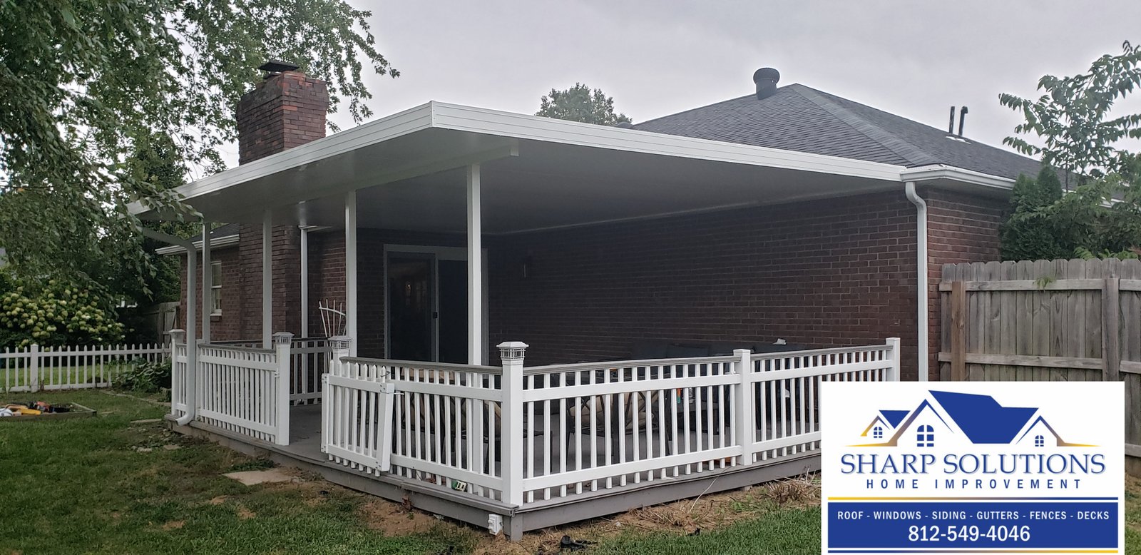 Black Roofing Tile New Roof Gutters on porch Deck overlooking the backyard Window overlooking patio