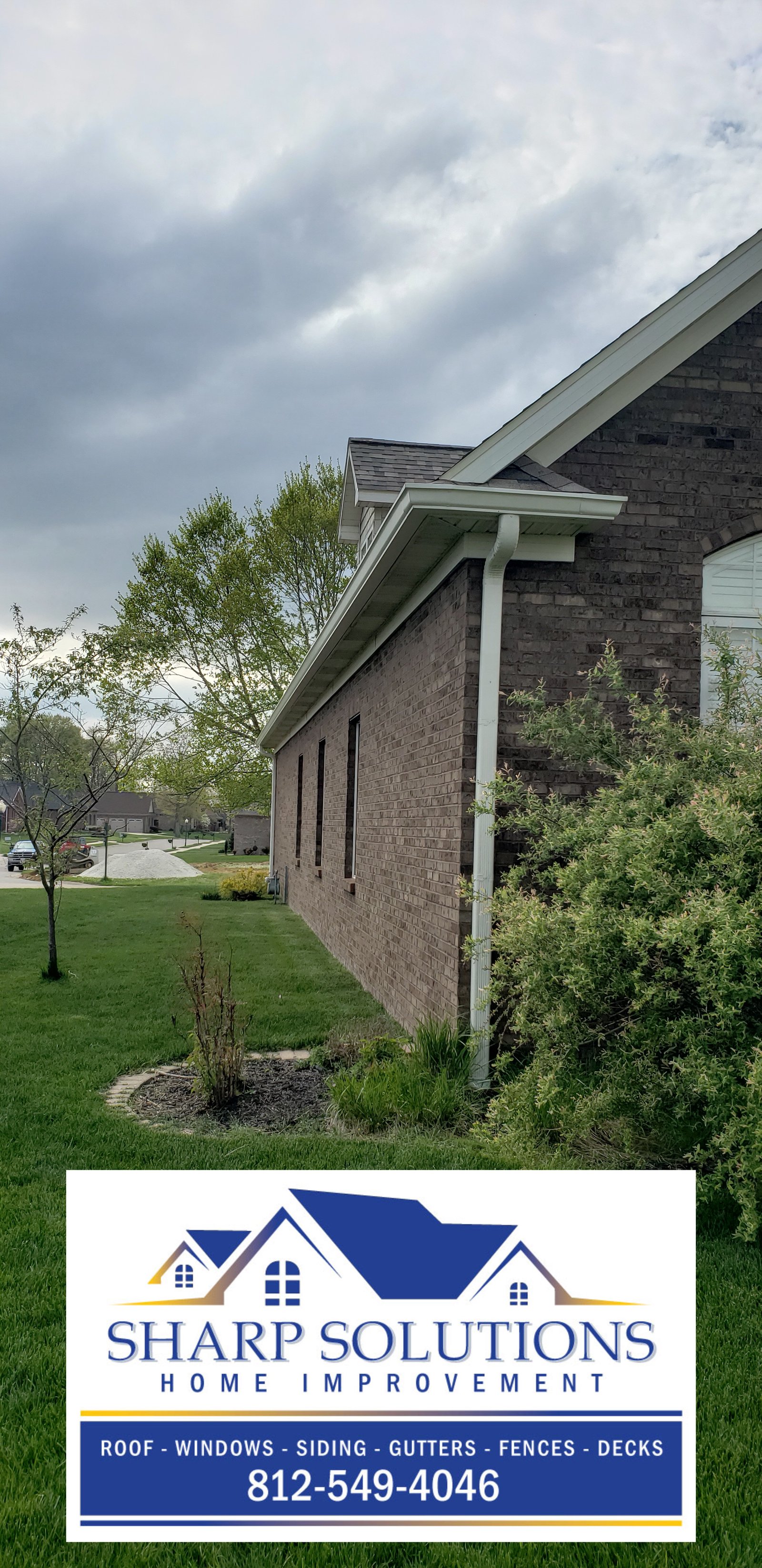 Black Roofing Tile New Roof Gutters on porch Deck overlooking the backyard Window overlooking patio