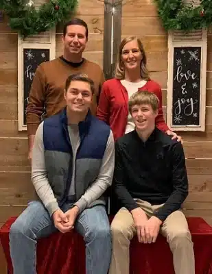 Image of Mike Sharp and his family wife and two sons